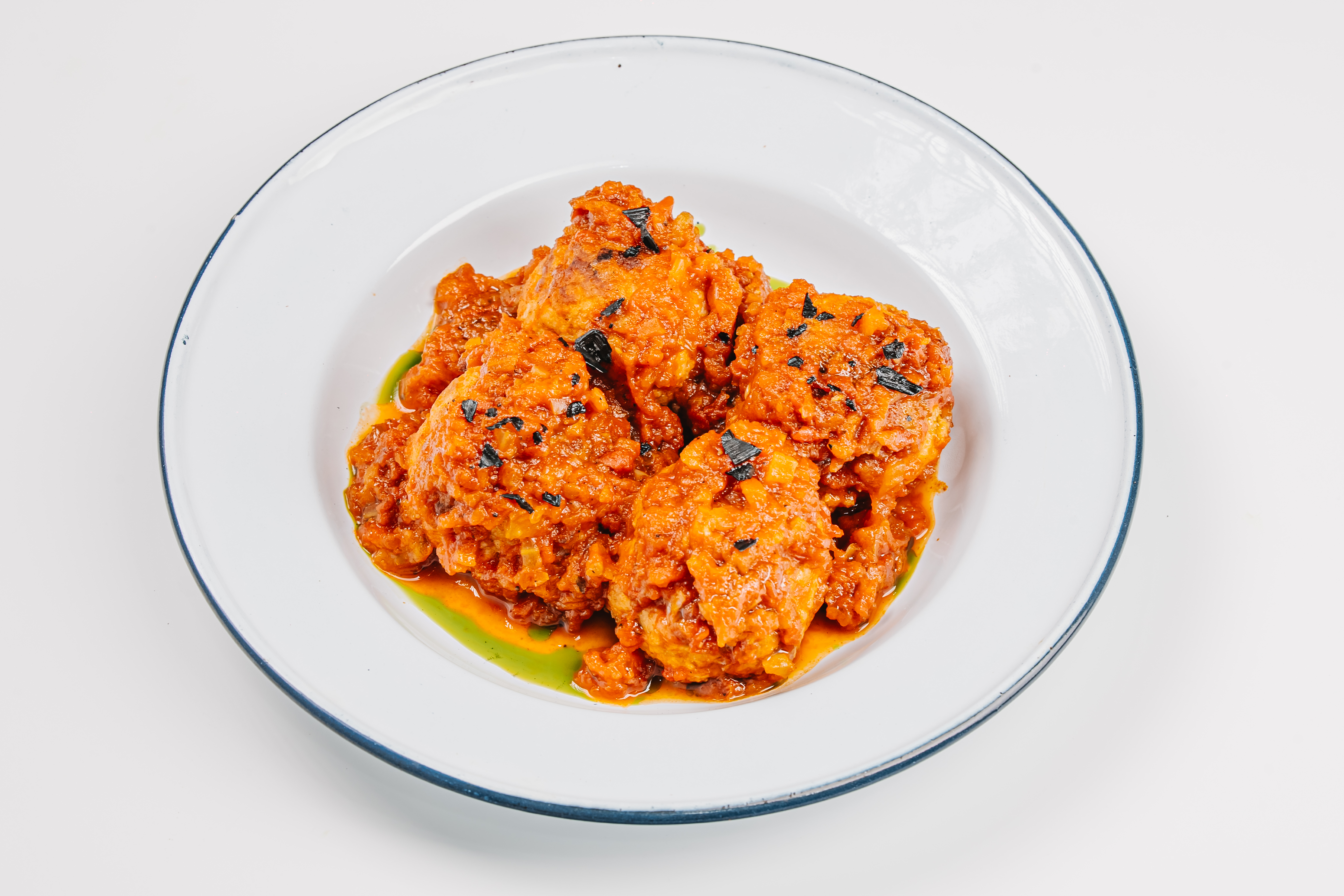 Albóndigas De Cerdo Estofadas  Braised pork meatballs, tomato sauce